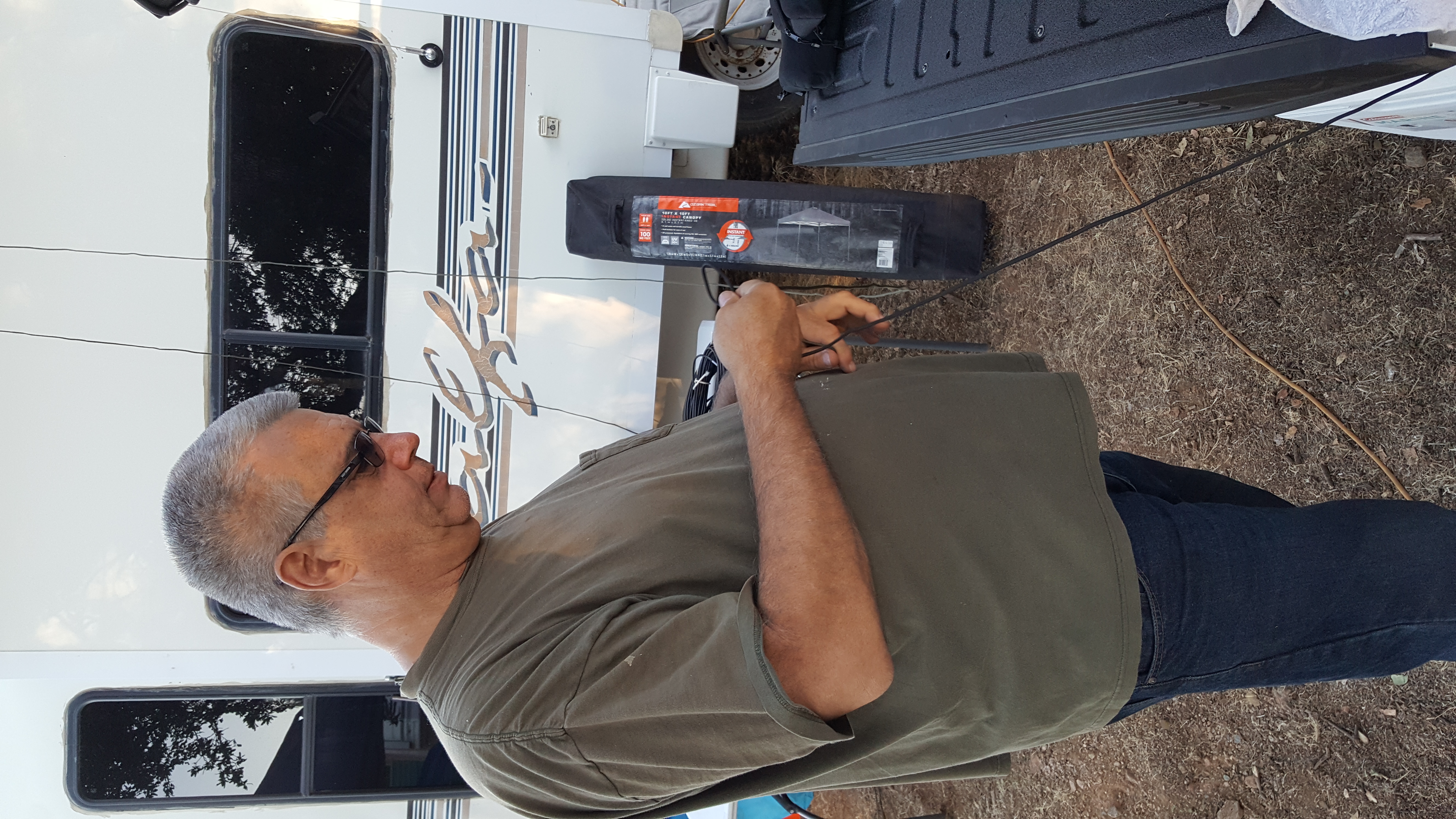 Steve HTV inspects some rigging for an antenna