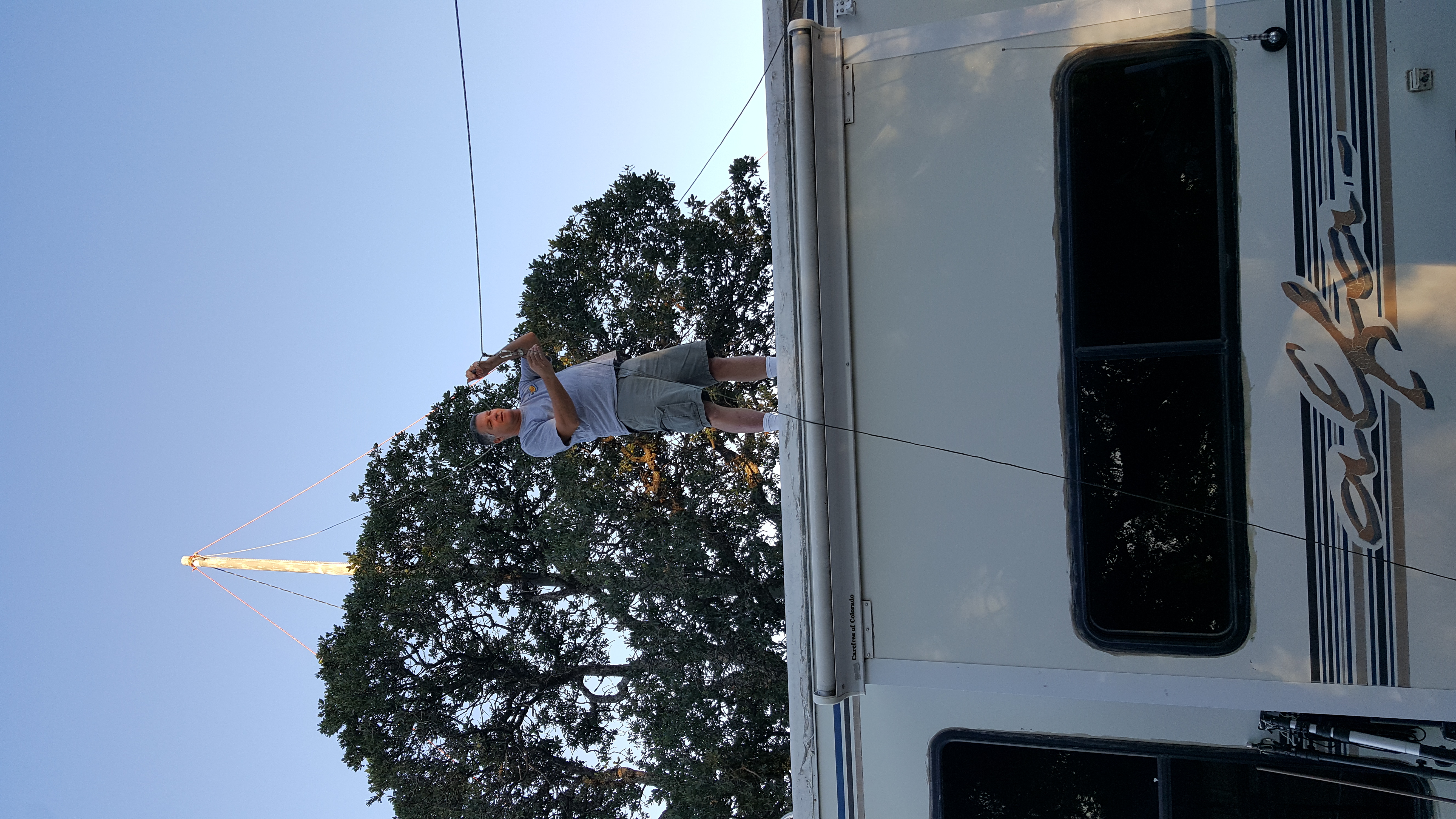 Jerry JKH preparing antenna rigging atop an RV