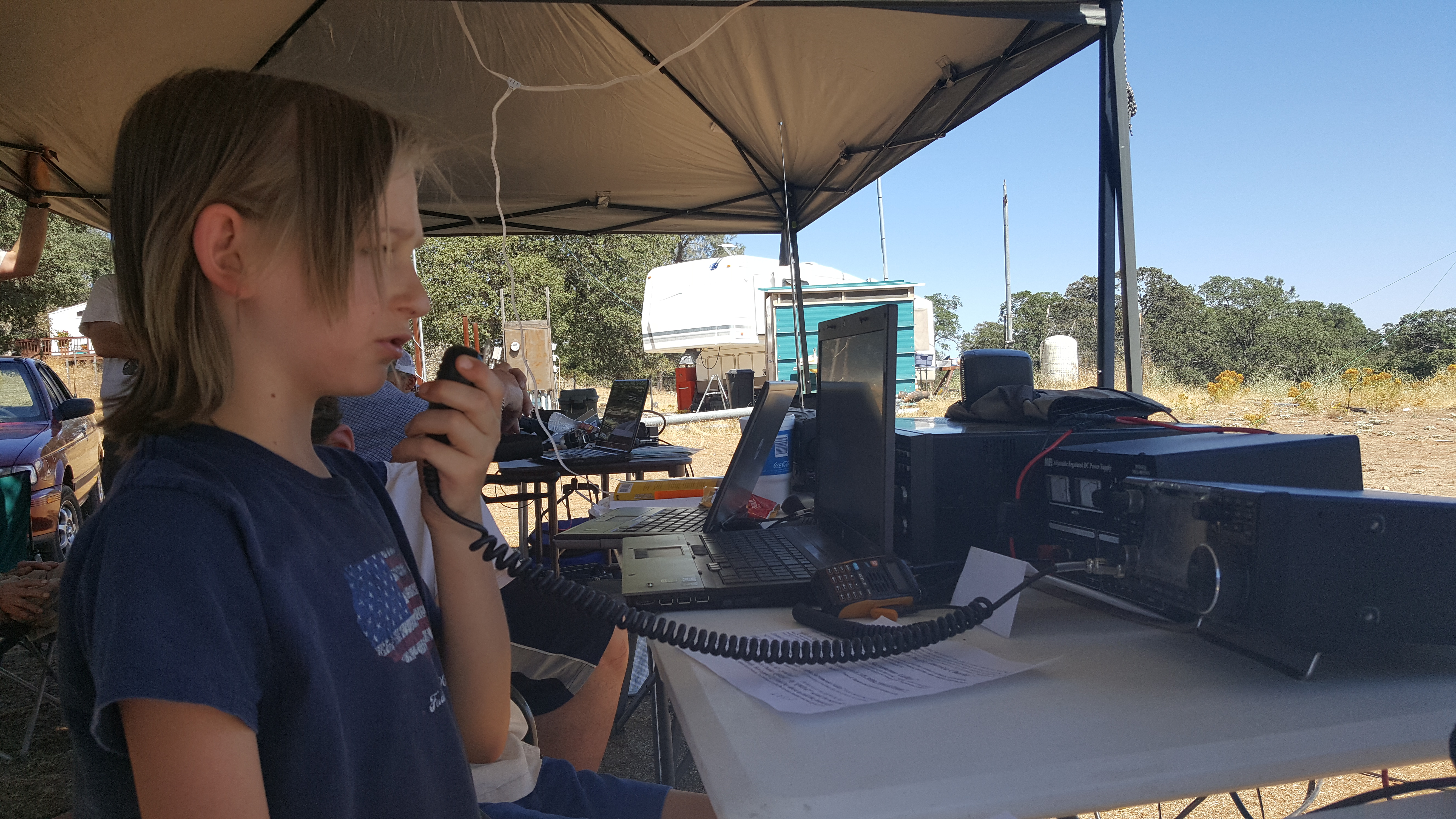 A YL makes voice contacts on Field Day