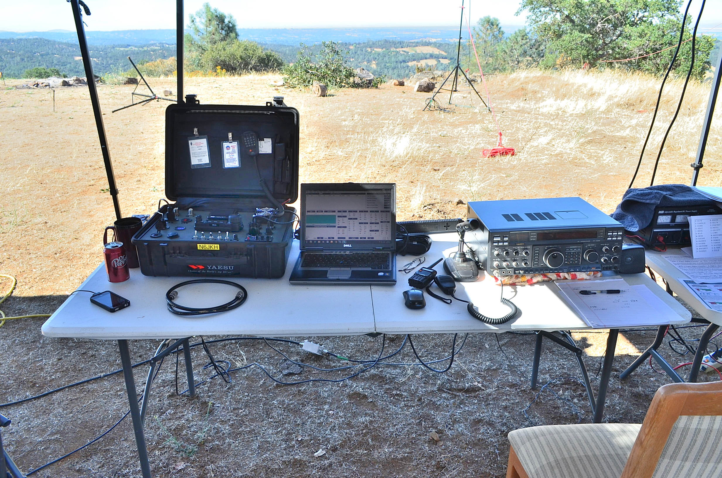 A view of HF radios in the shade, ready to operate on Field Day