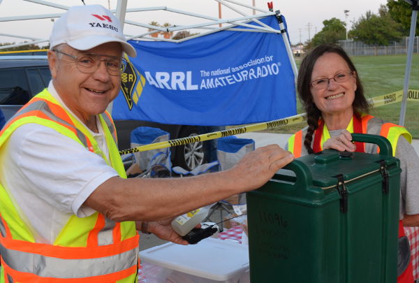 Roger UO and Katy YCP take charge of the coffee urn