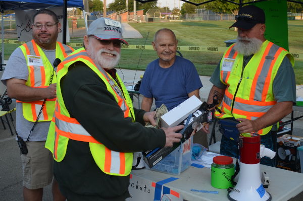 Art NFM, Michael BUK, Claire VWG, and Bill YCO prepare to award raffle prizes