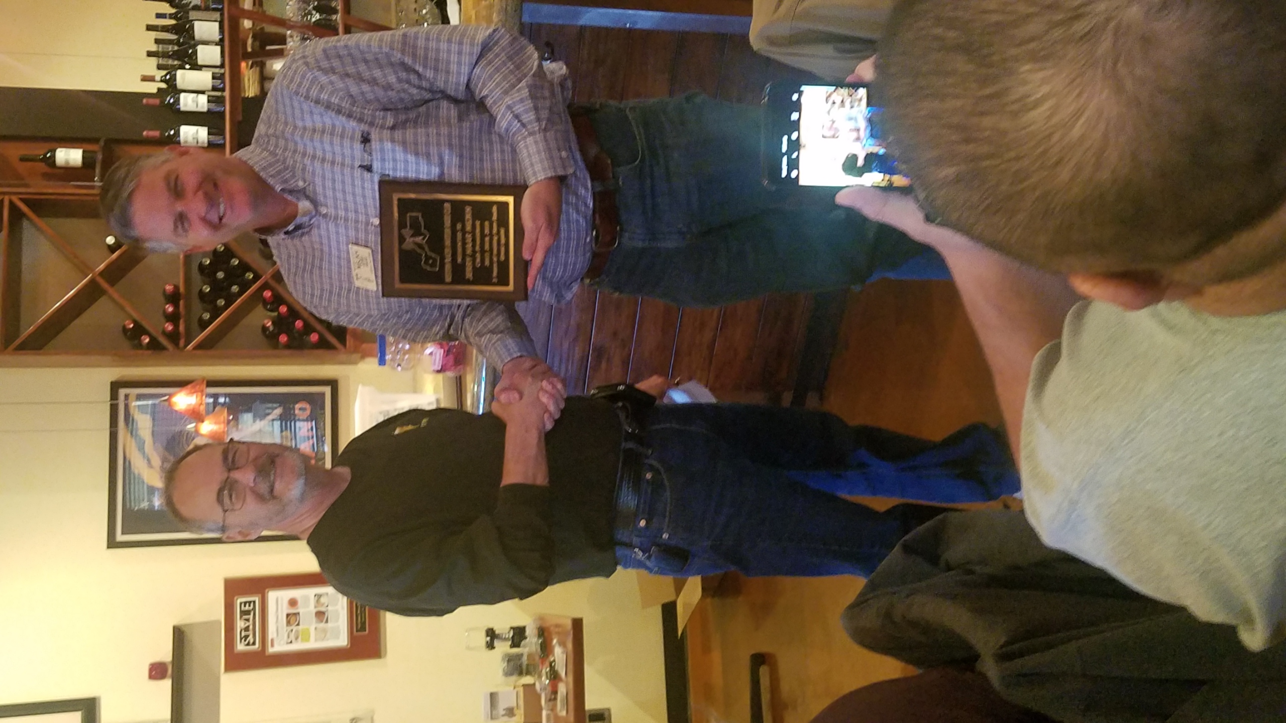 Frank FMB presents Jerry JKH an appreciation plaque for his Presidential service